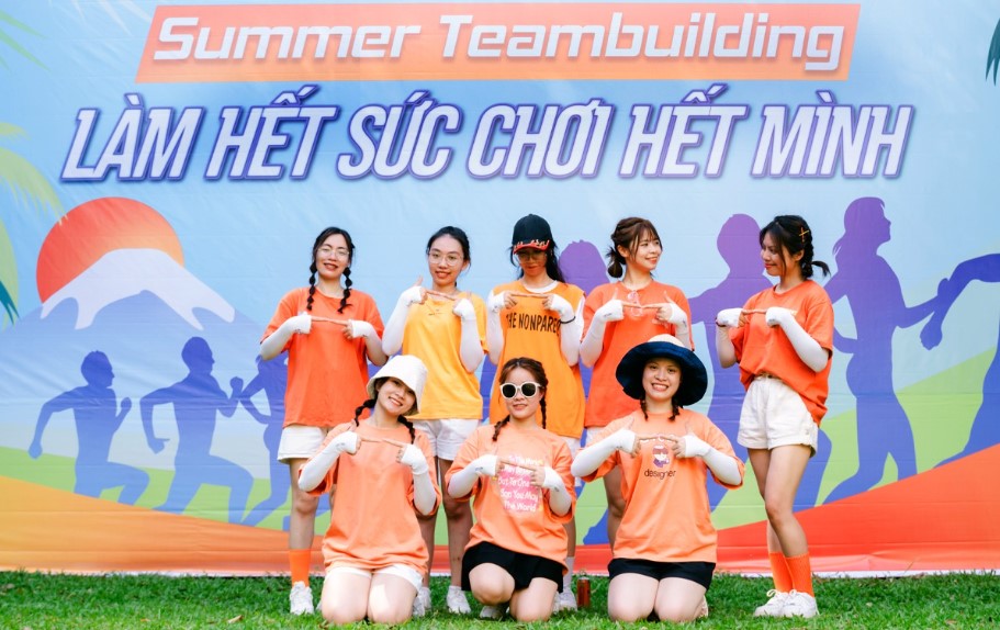 Áo đồng phục màu cam teambuilding