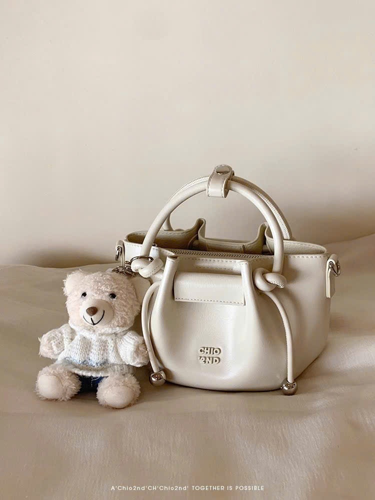 A573 - TÚI XÁCH CHIO TRẮNG KEM SIZE 17CM