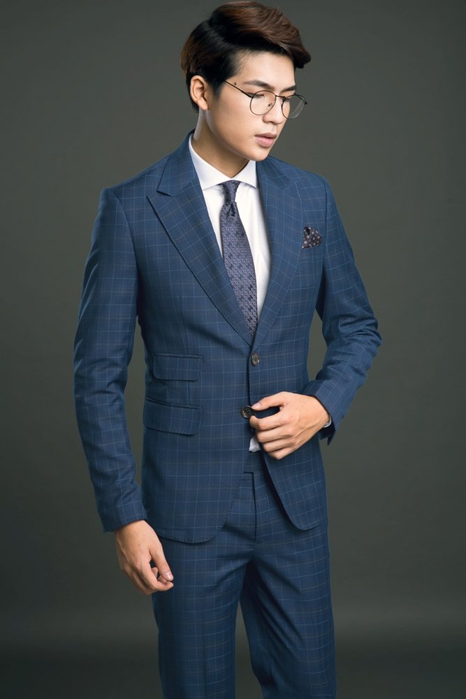 Vest xanh navy bạc màu , kẻ chỉ đen- xanh- cam