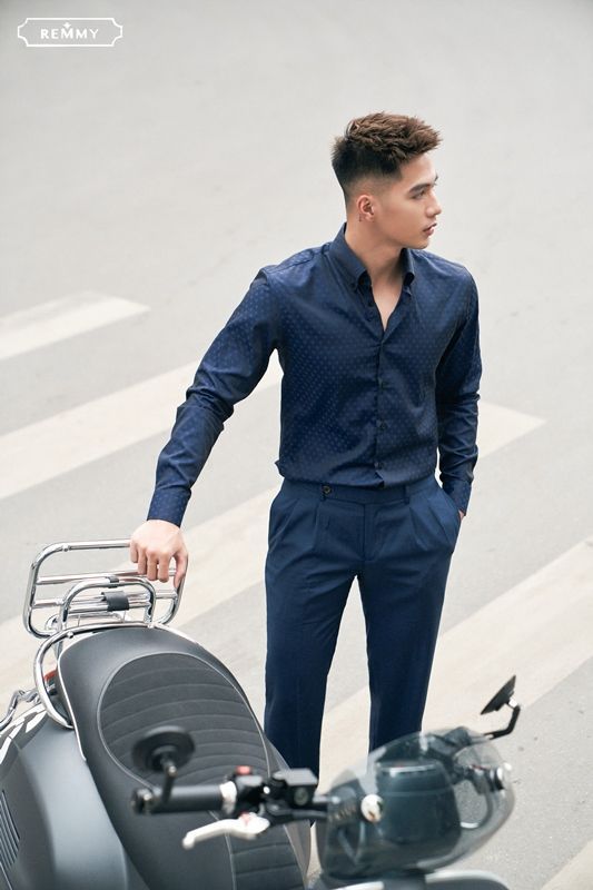 SM xanh tt đậm, ht dấu cộng xanh sáng, cài cúc lá cổ