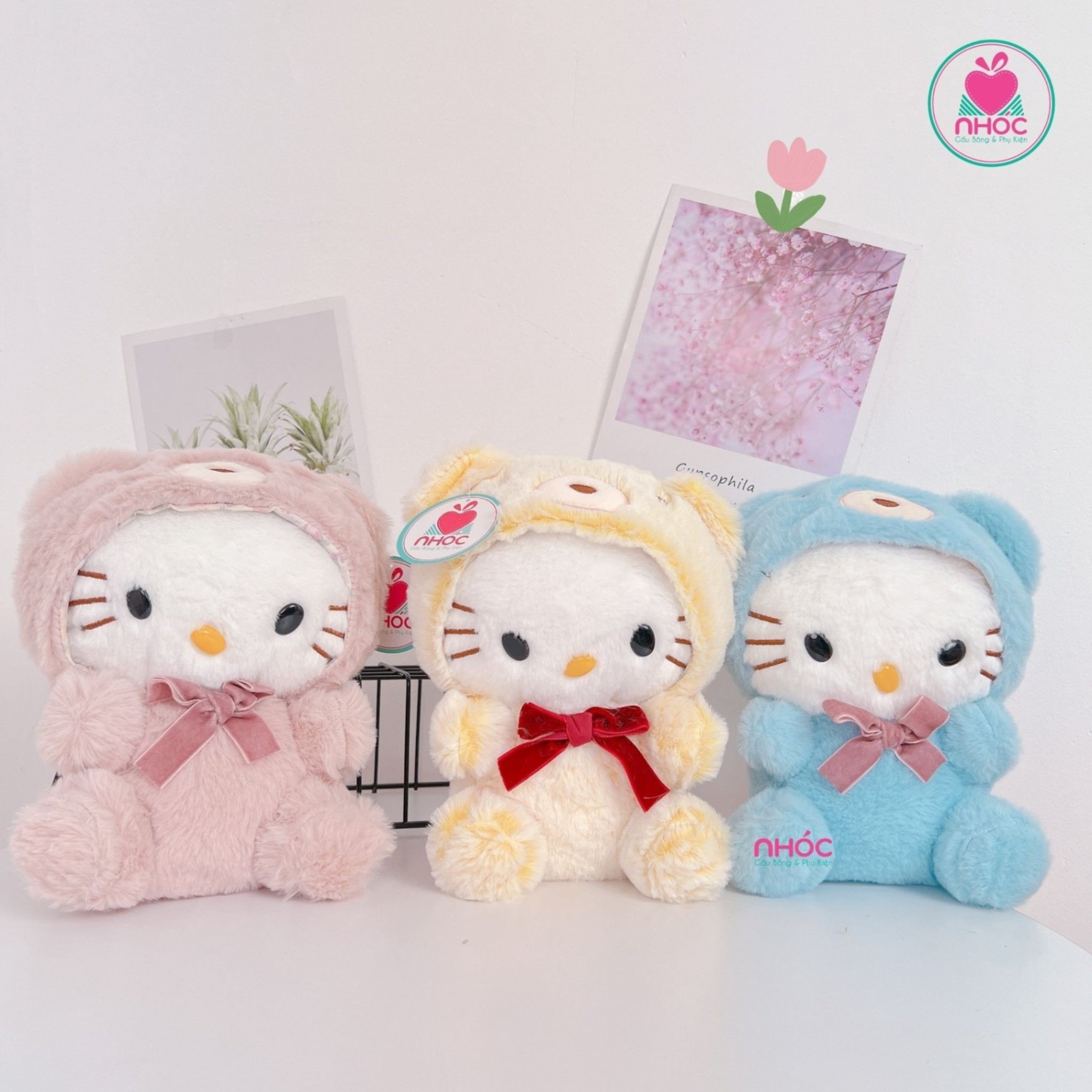 Thú bông nhỏ Hello kitty mặc áo thú đính nơ lông xù - 8501