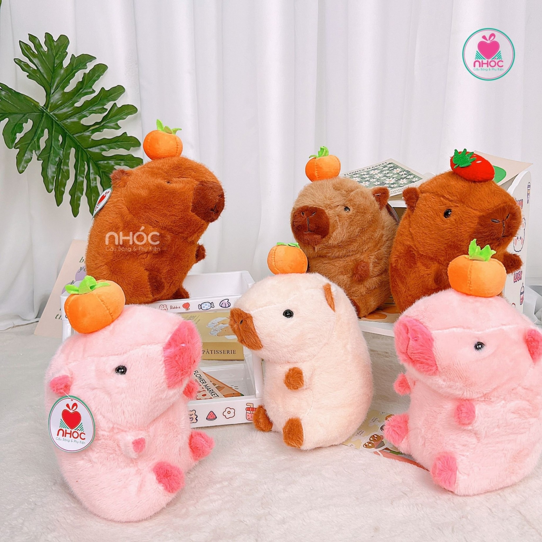 Thú bông nhỏ Capybara đính trái cam