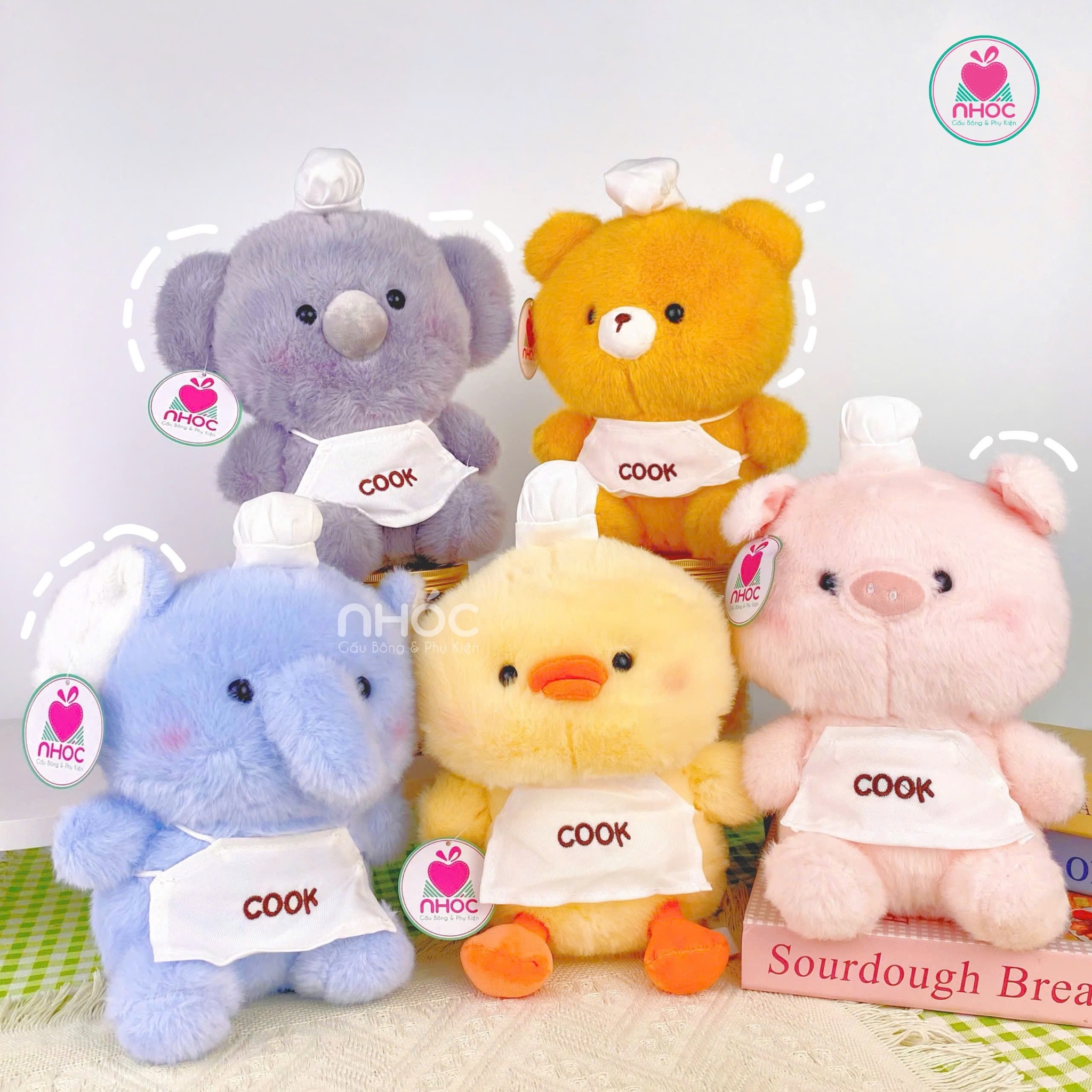 Thú bông nhỏ đeo tạp về Cook