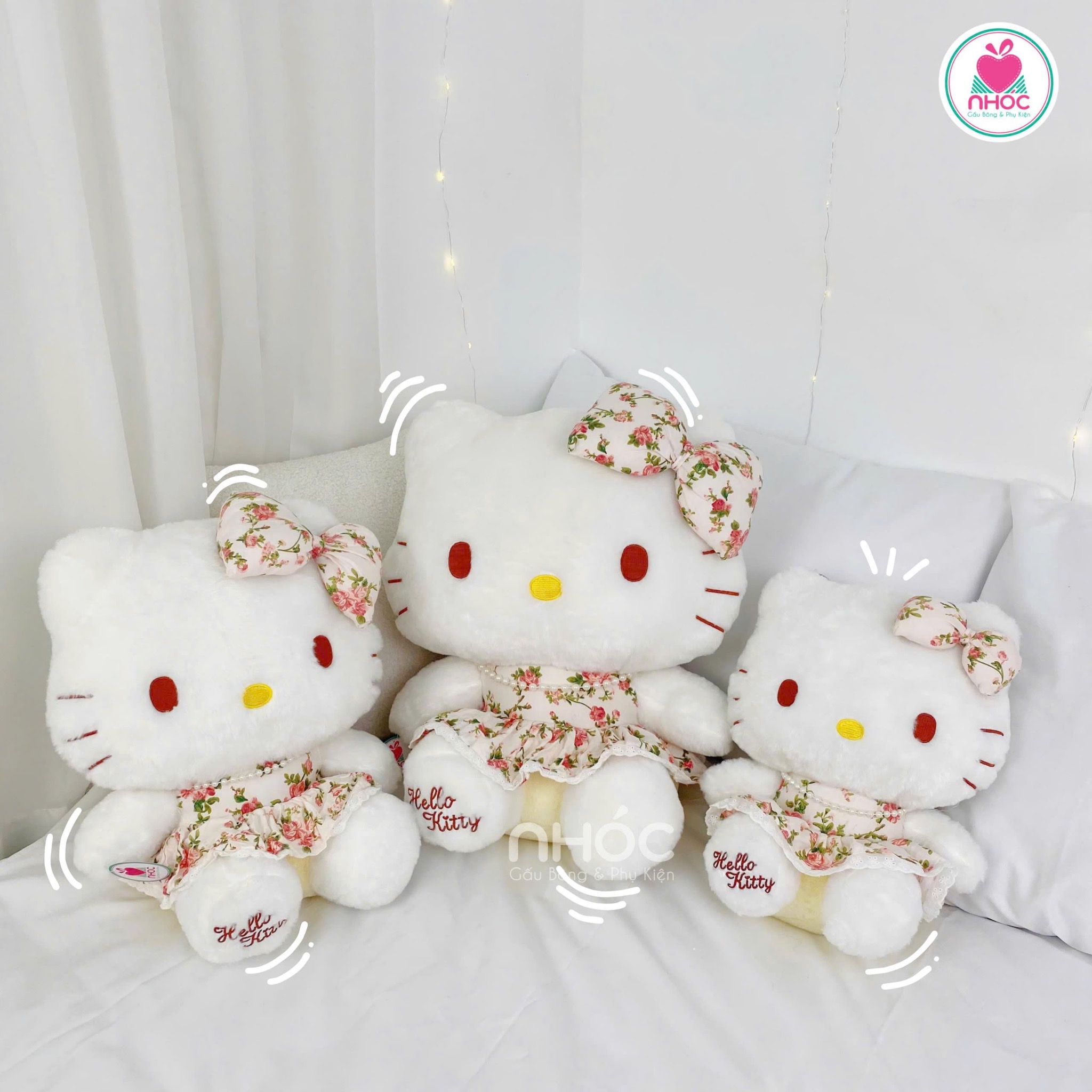Thú bông Hello Kitty mặc đầm hoa đeo ngọc trai ngồi
