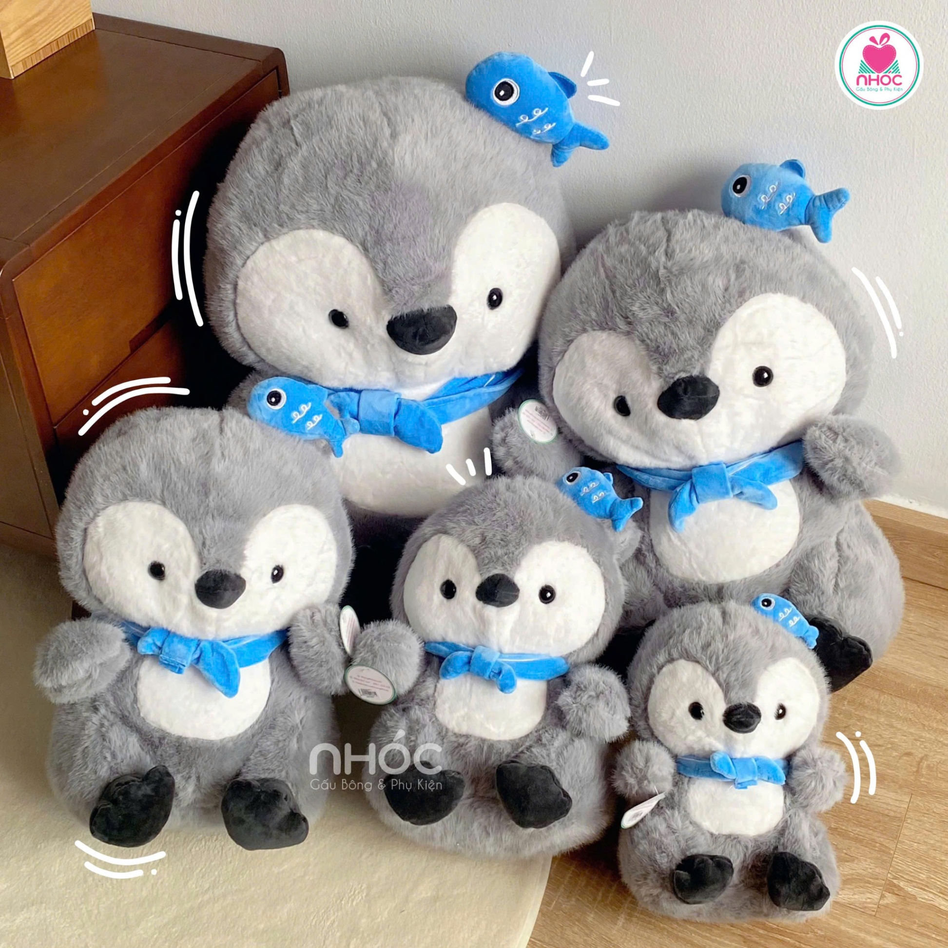 Thú bông Chim cánh cụt đầu đính cá lông xù ngồi