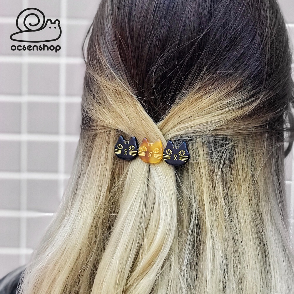 Kẹp tóc đá trong nhiều mặt mèo