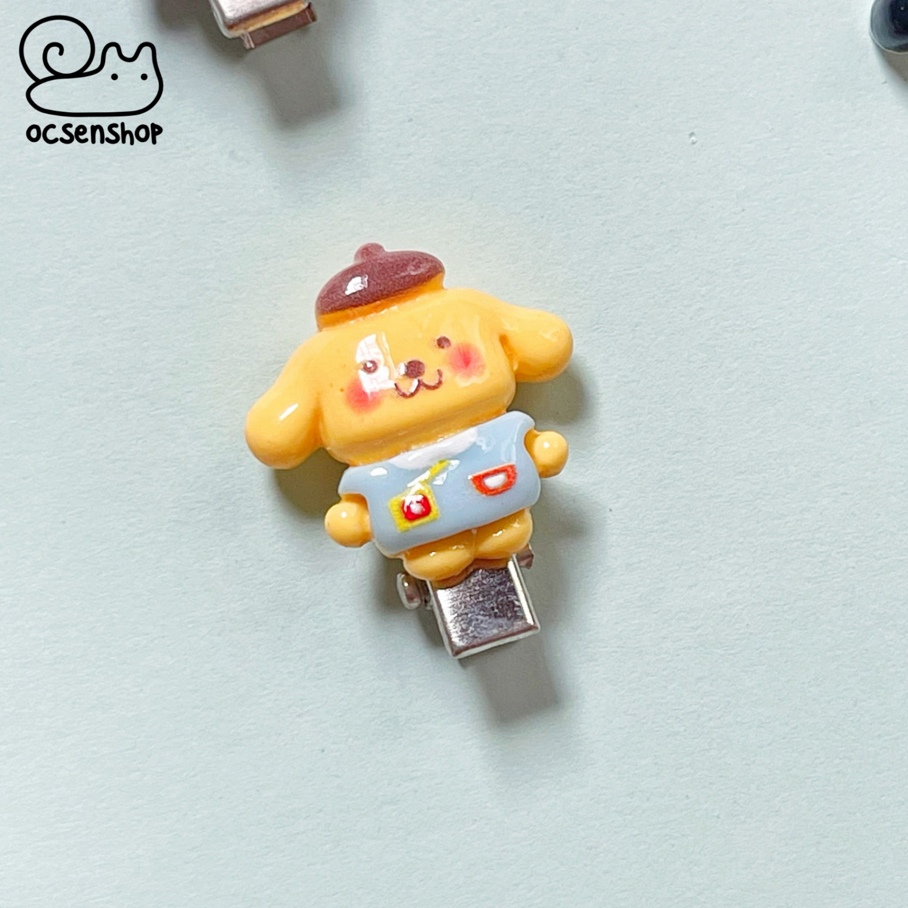 Set kẹp tóc Sanrio áo xanh (2c)