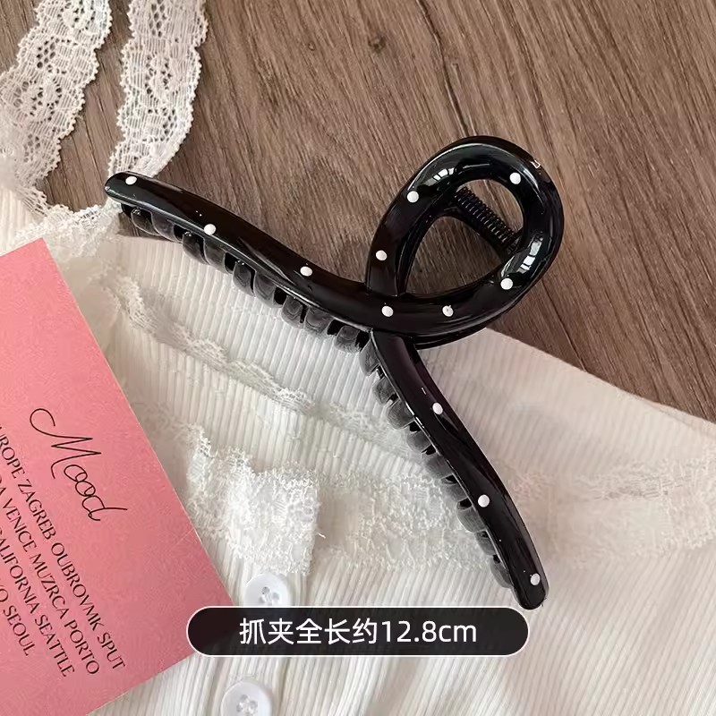 Kẹp càng cua chấm bi