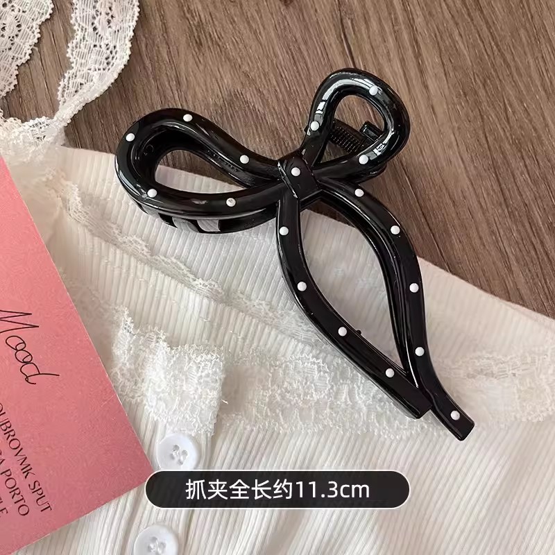 Kẹp càng cua chấm bi