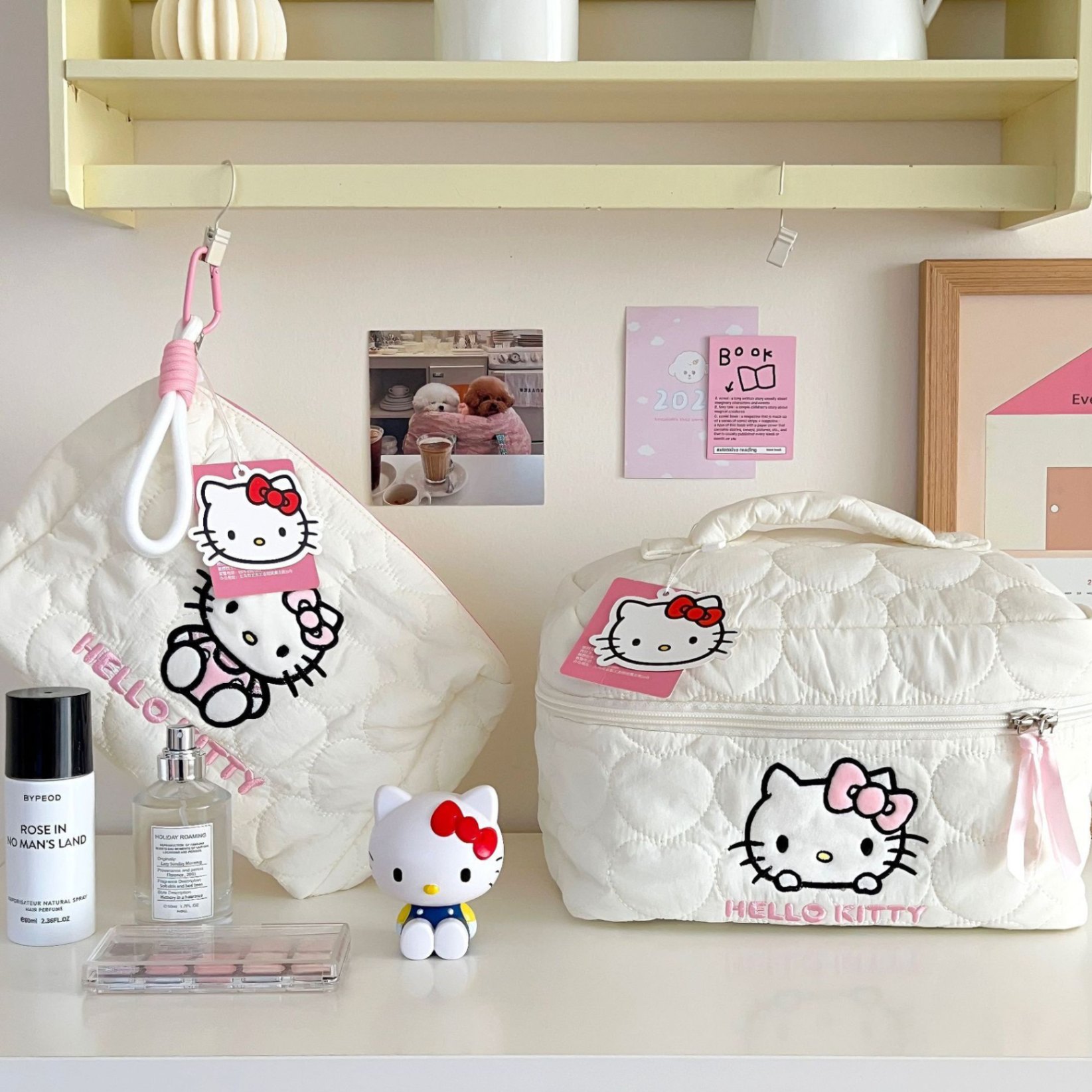 Túi đựng mĩ phẩm hình thêu Hello Kitty