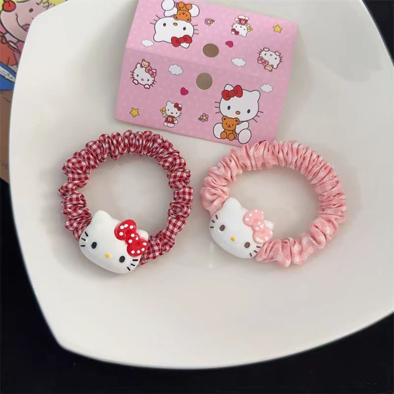 Chun buộc tóc vải nhún kẻ Hello Kitty