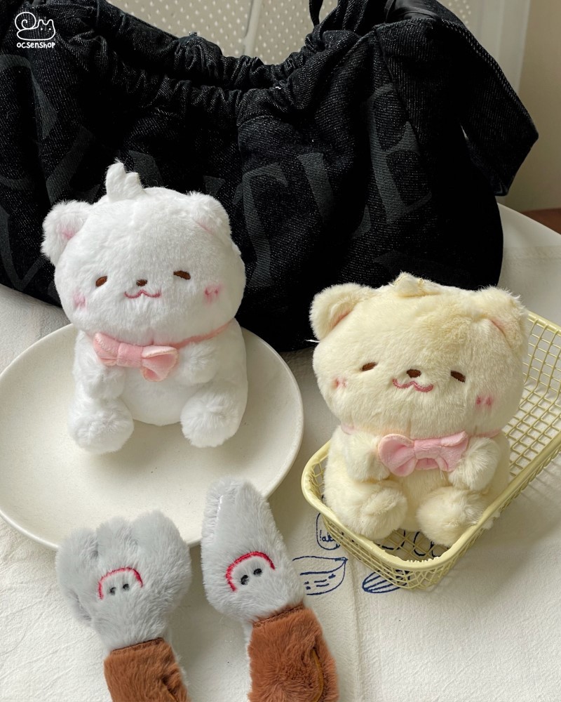 Móc khóa bông gấu đeo nơ hồng