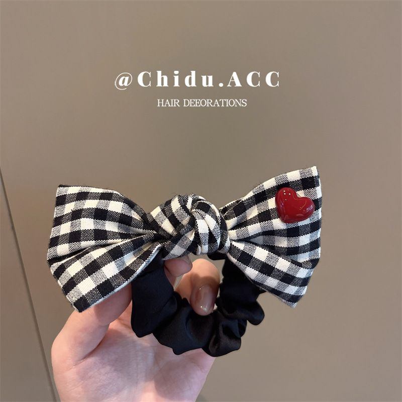 Chun buộc tóc Nơ kẻ ô charm trái tim