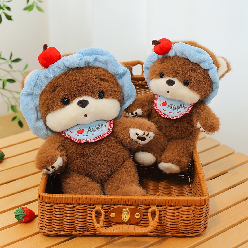 Gấu bông đeo băng đô xanh