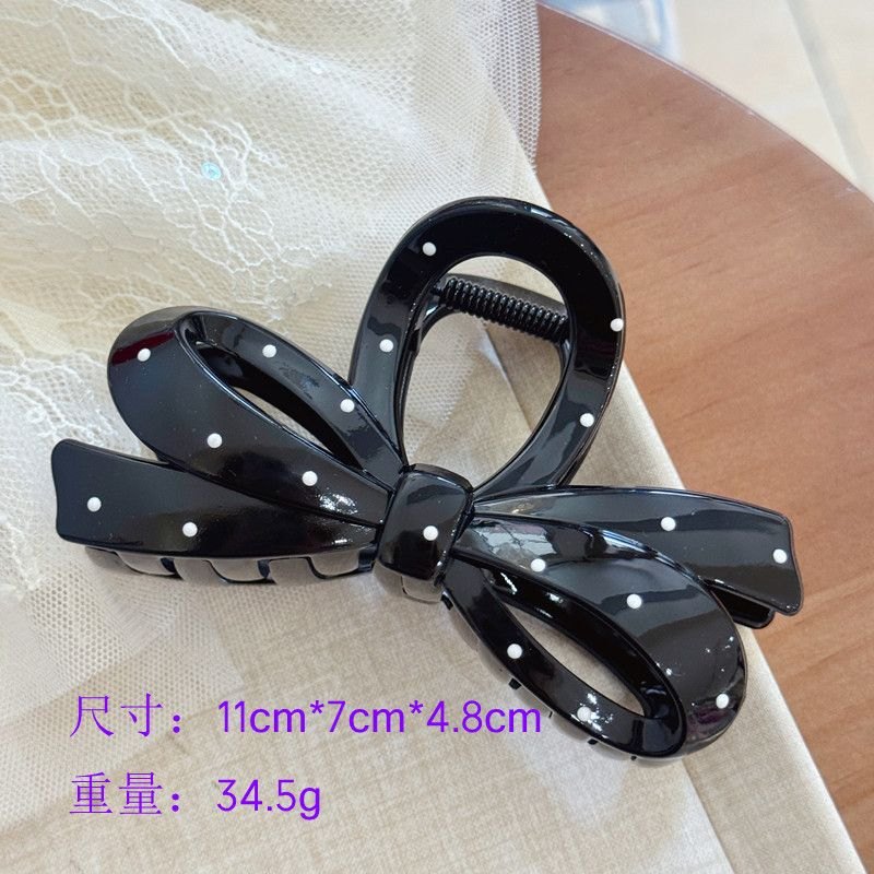 Kẹp càng cua chấm bi