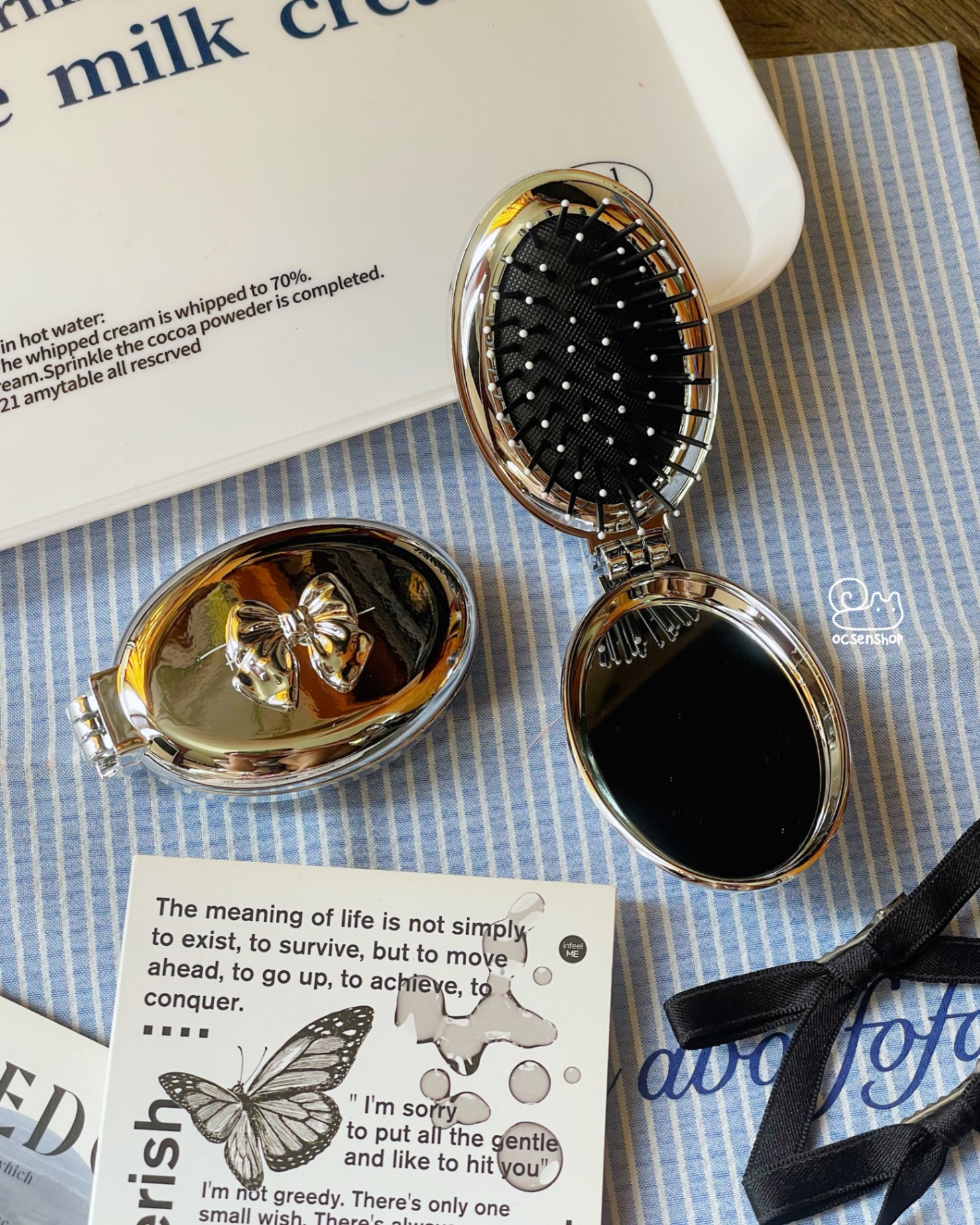 Lược gập kèm gương tròn bạc gắn nơ