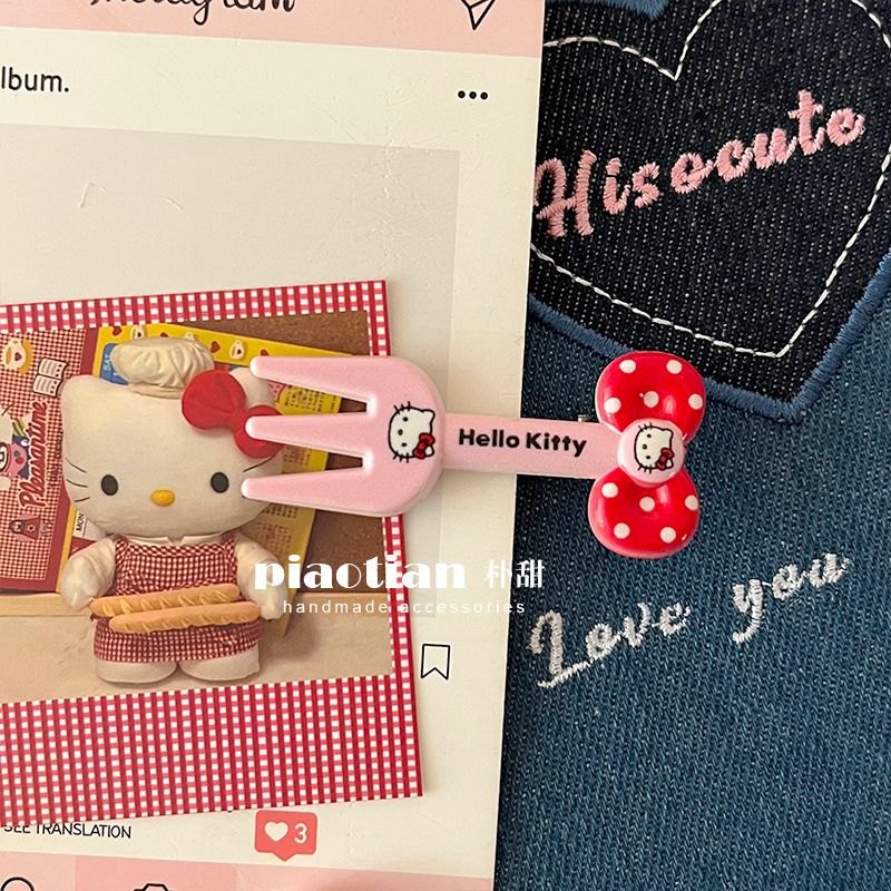 Kẹp tóc Hello Kitty hình dĩa