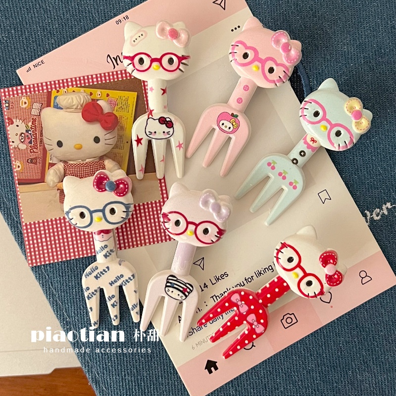 Kẹp tóc Hello Kitty hình dĩa