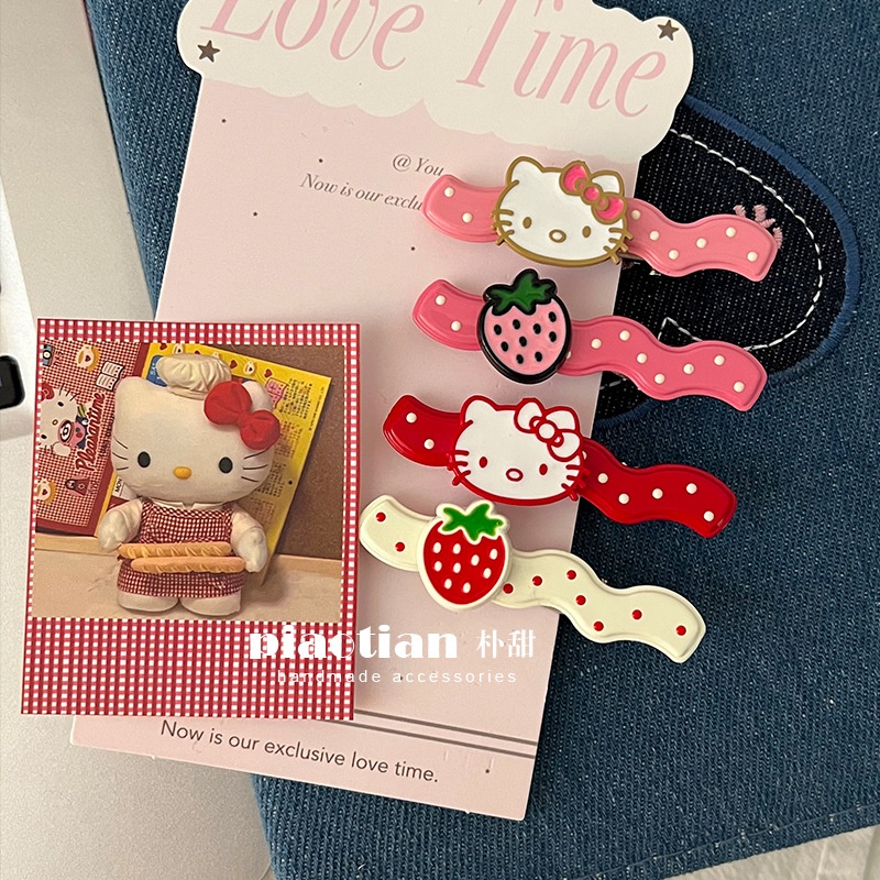 Set kẹp tóc lượn sóng Hello Kitty dâu (2c)(mix mẫu)