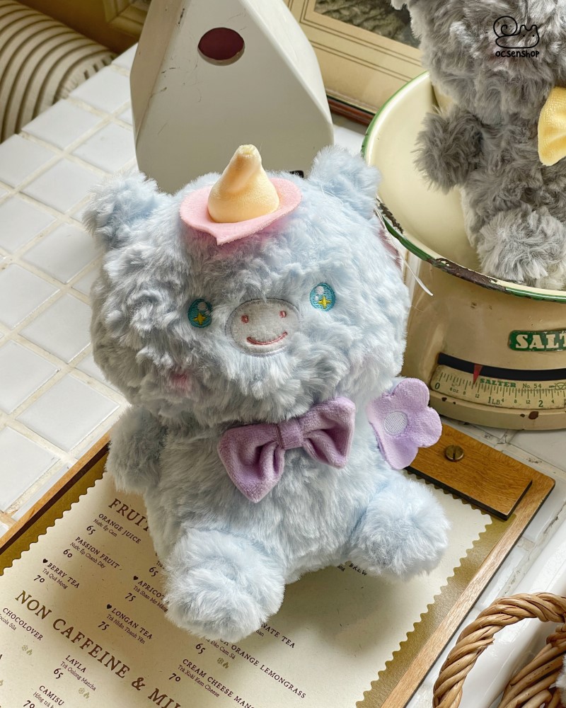 Động vật bông đeo nơ cầm hoa (20cm)