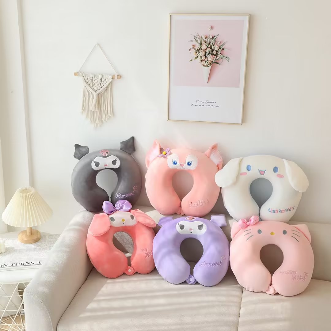 Gối kê cổ cúc bấm Sanrio