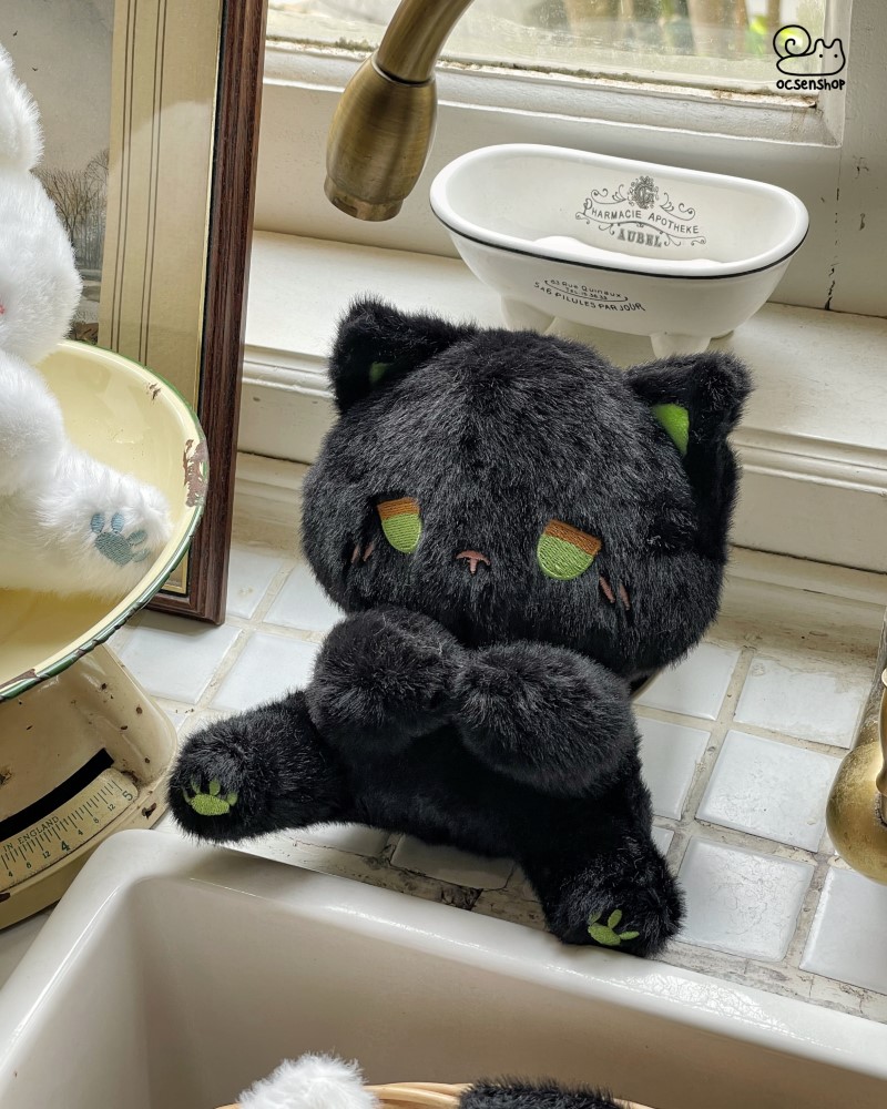 Mèo bông ngồi mặt buồn (25cm)