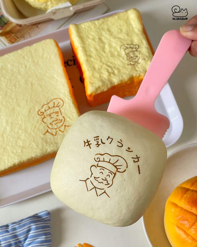 Squishy Moozy bánh màn thầu vuông ông già (kèm túi)