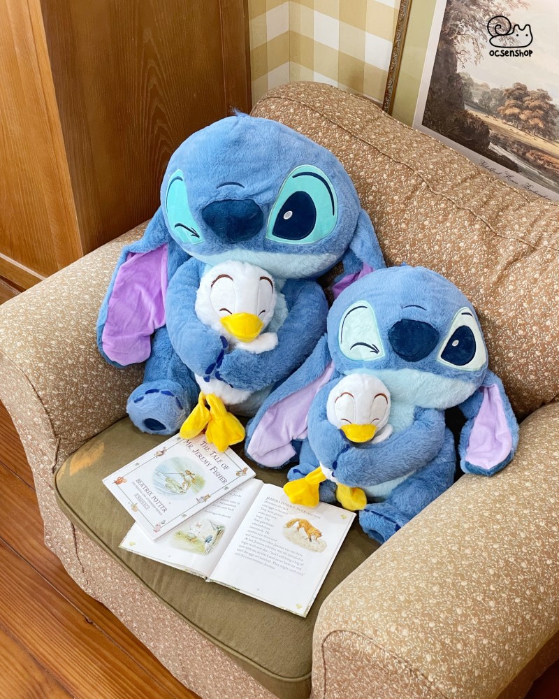 Stitch bông nháy mắt ôm vịt