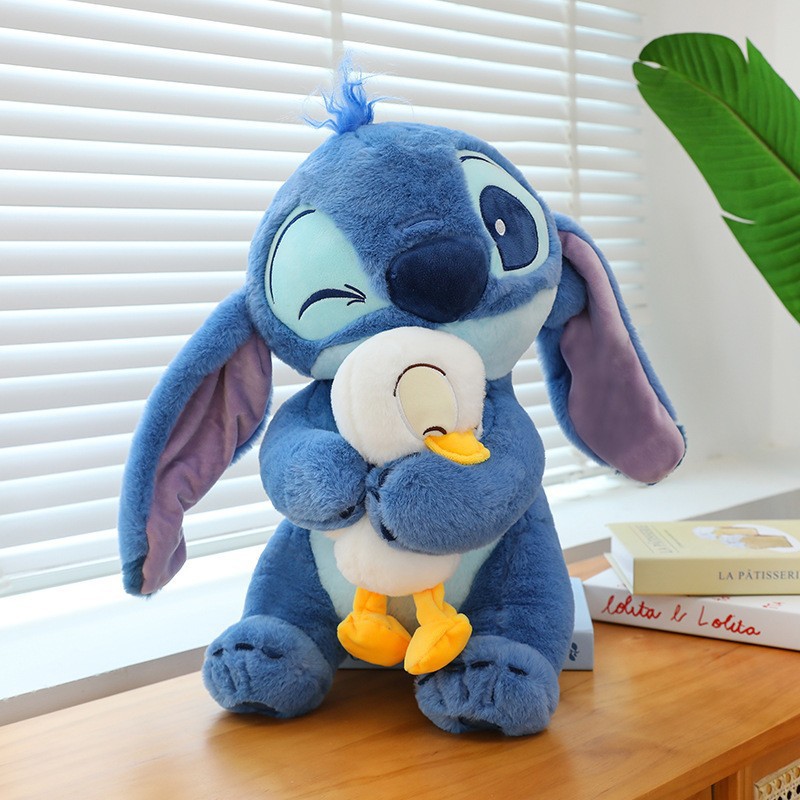 Stitch bông nháy mắt ôm vịt