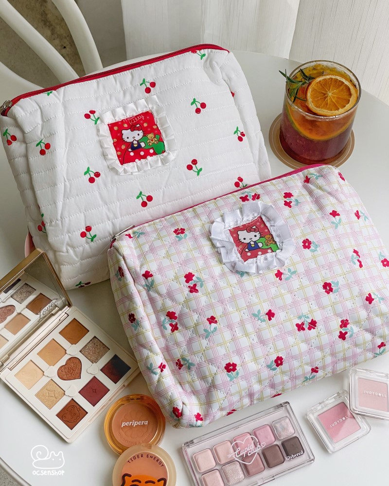 Túi đựng mĩ phẩm Hello Kitty nền hoa đỏ