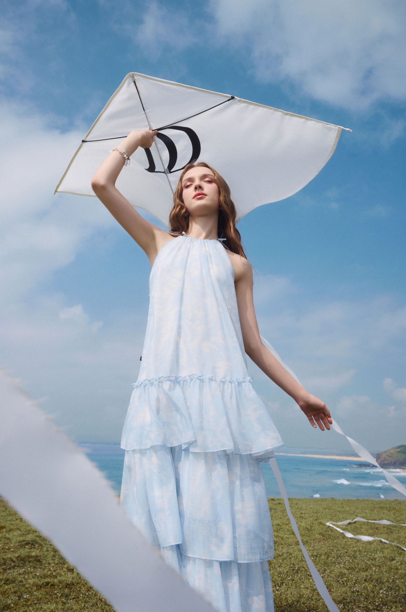 Đầm cổ yếm nhún chân 3 tầng
