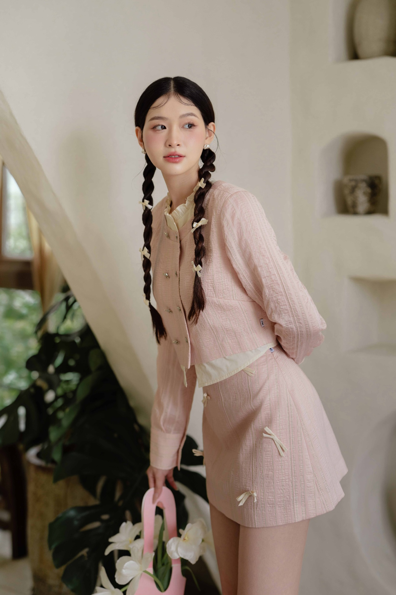 Chân váy A đính nơ nhỏ Kẻ