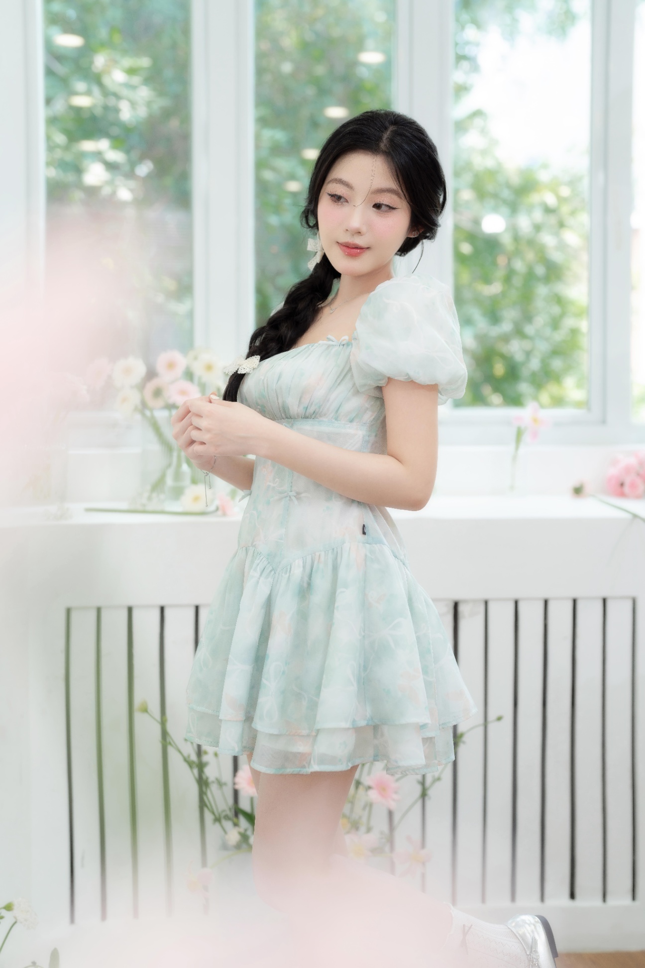Đầm nhún ngực đính nơ 2 tầng