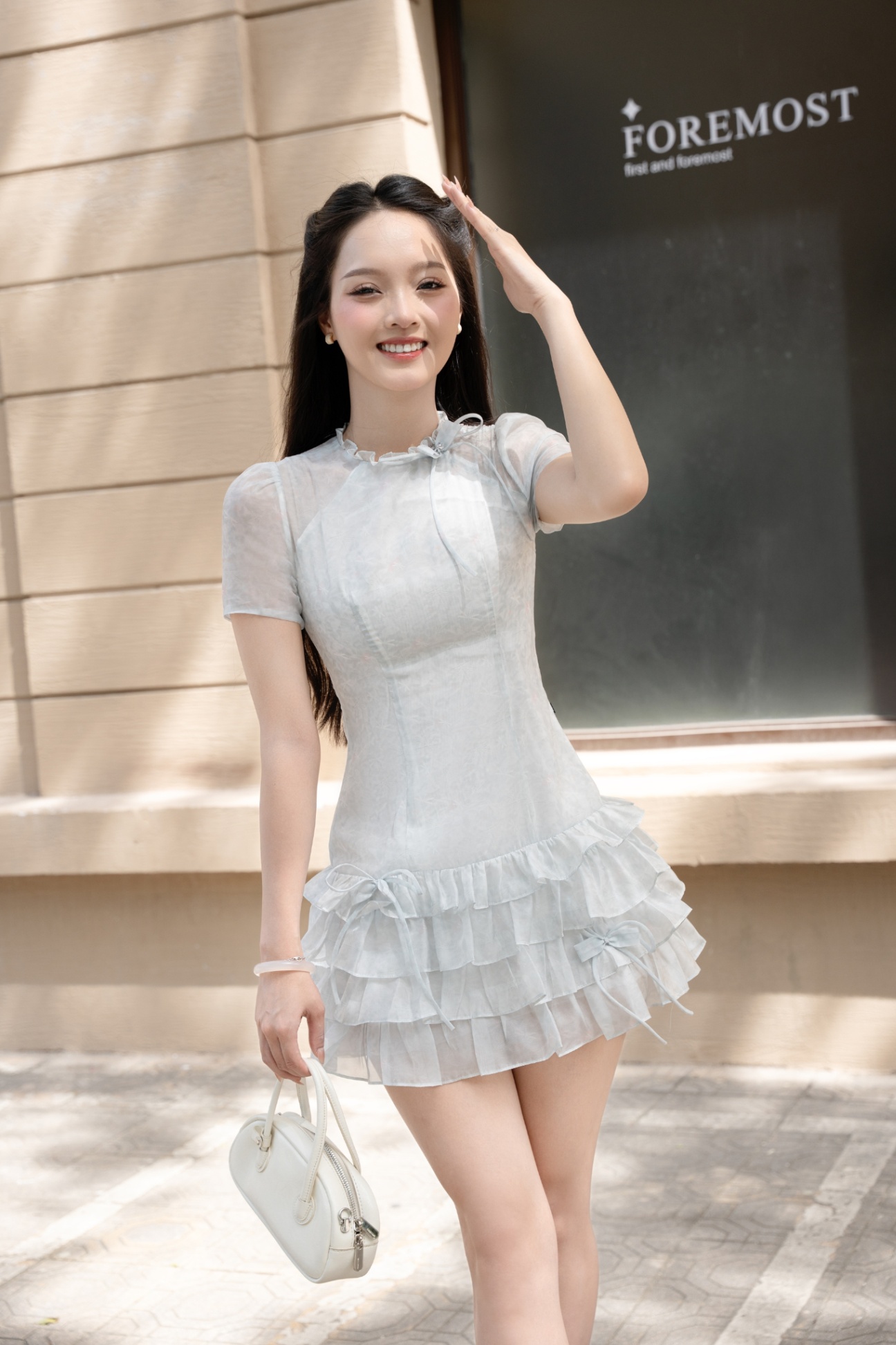 Đầm dáng ôm đuôi nhún bèo đính nơ