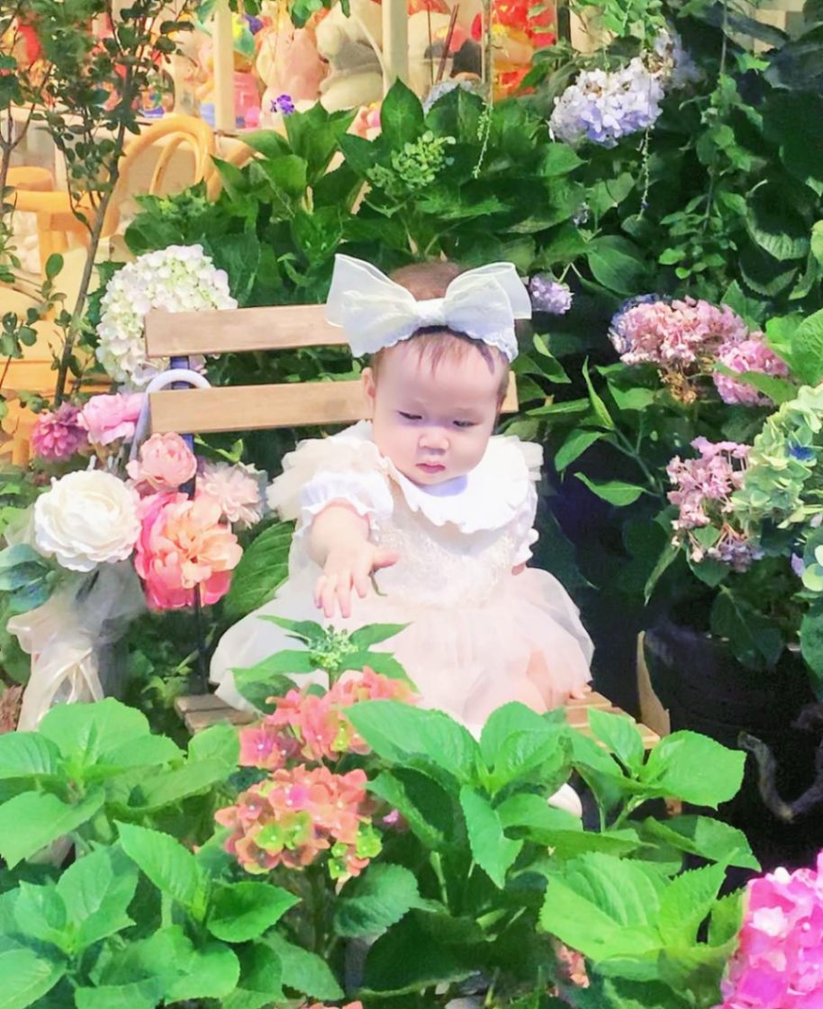 Kids on flowers