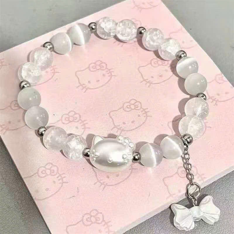 Vòng tay pha lê đá - Trắng kitty nơ