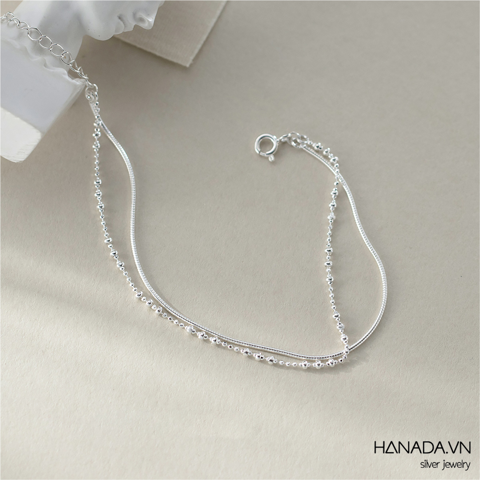 Lắc tay đôi xích trơn bi 1MM 2707