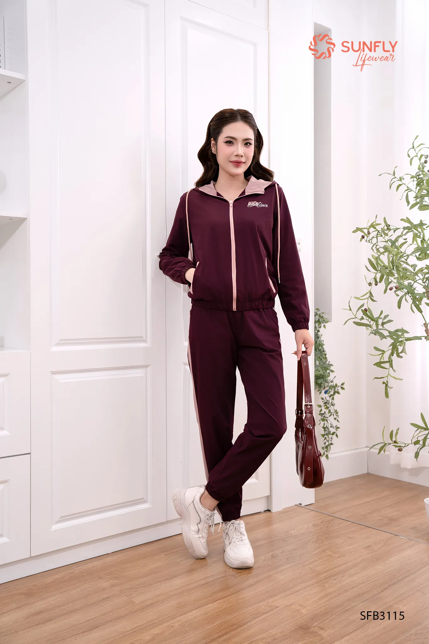 Set đồ nữ gió áo dài kéo khóa có mũ quần dài SFB3115 XL tím trà