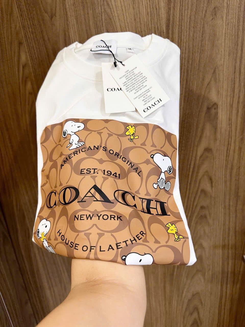 ÁO PULL CỘC COACH PHỐI NÂU HÌNH CÚN