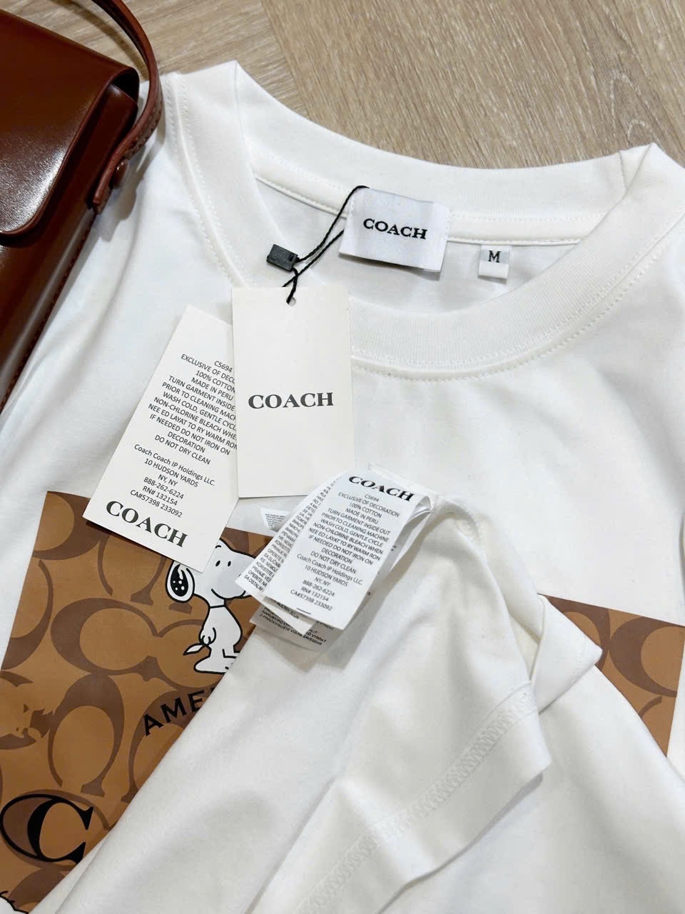 ÁO PULL CỘC COACH PHỐI NÂU HÌNH CÚN