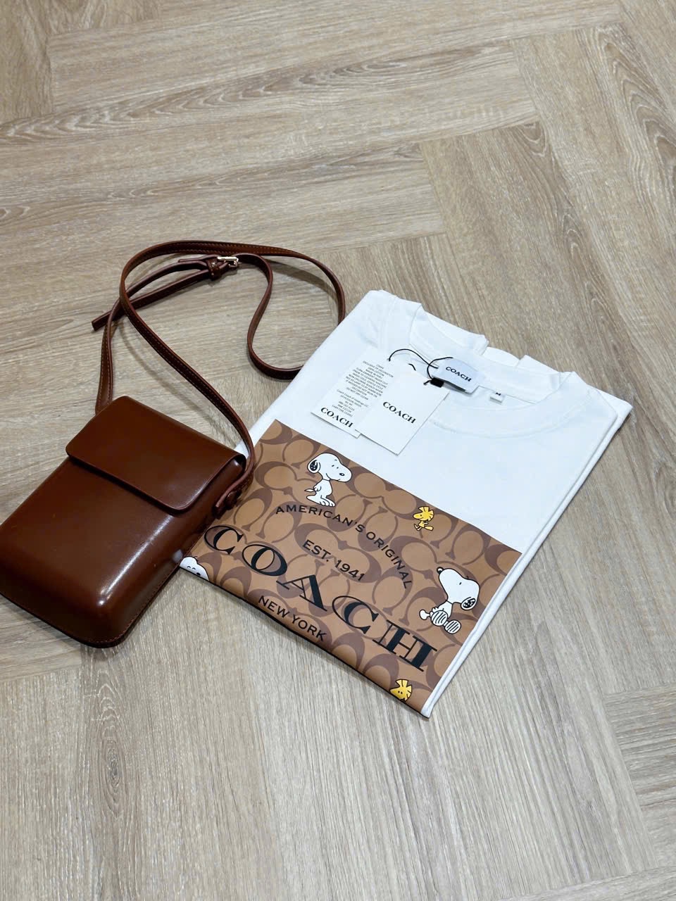 ÁO PULL CỘC COACH PHỐI NÂU HÌNH CÚN