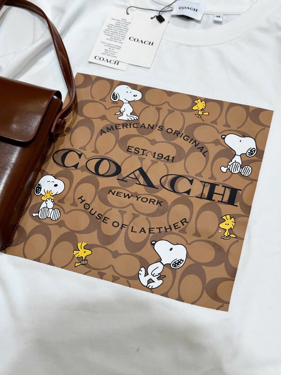 ÁO PULL CỘC COACH PHỐI NÂU HÌNH CÚN