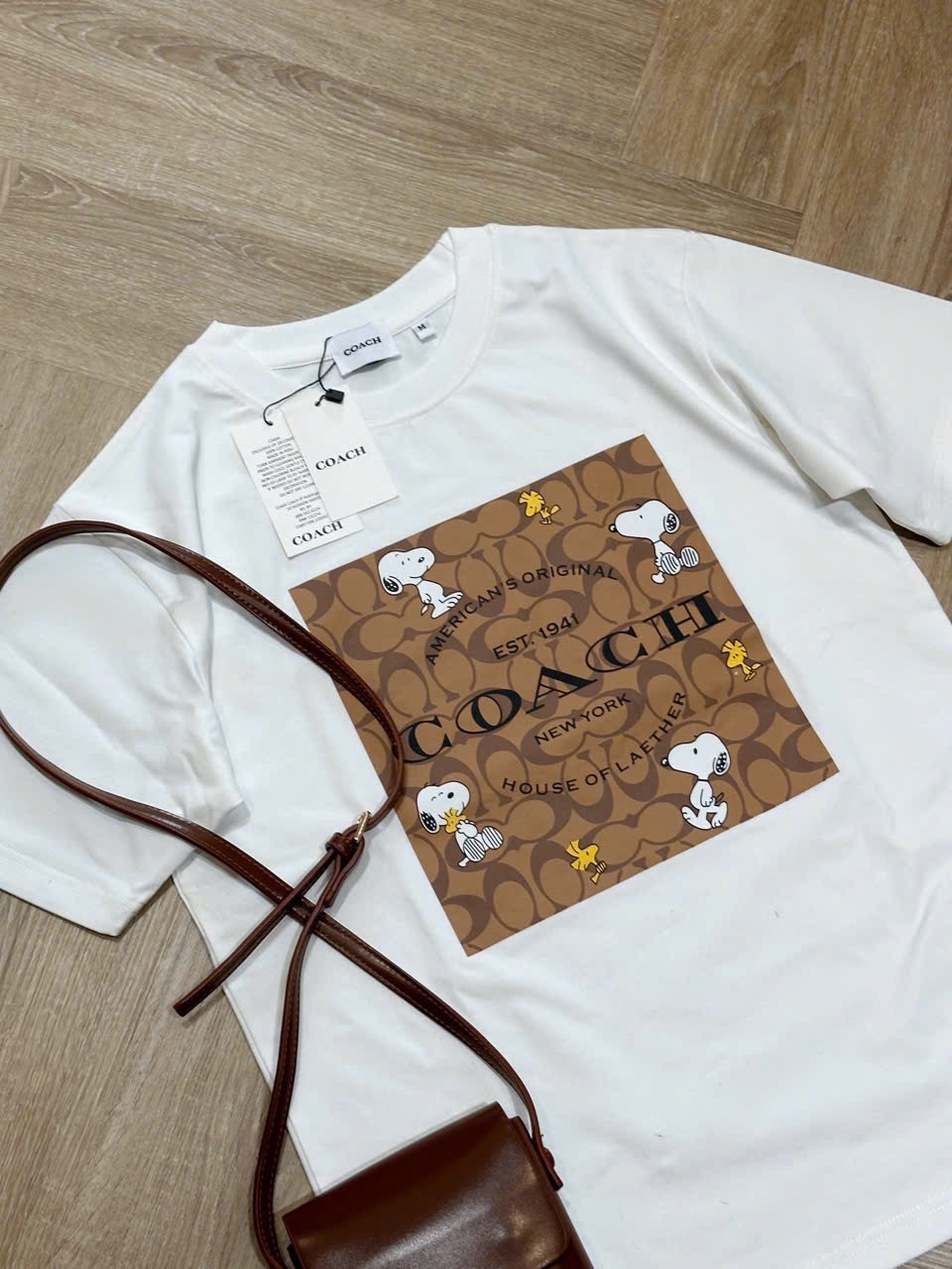 ÁO PULL CỘC COACH PHỐI NÂU HÌNH CÚN