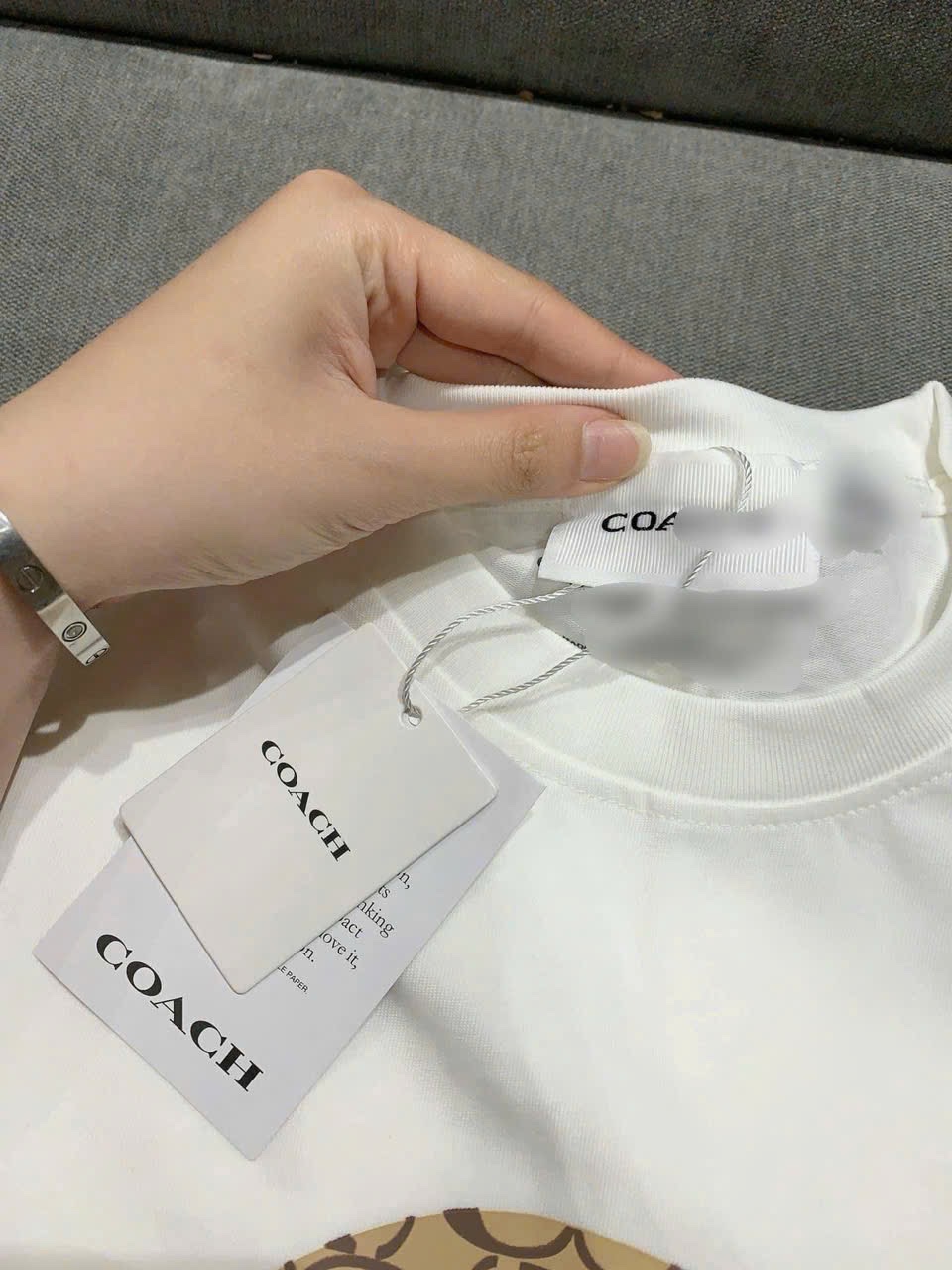 ÁO PULL CỘC COACH PHỐI NÂU HÌNH CÚN