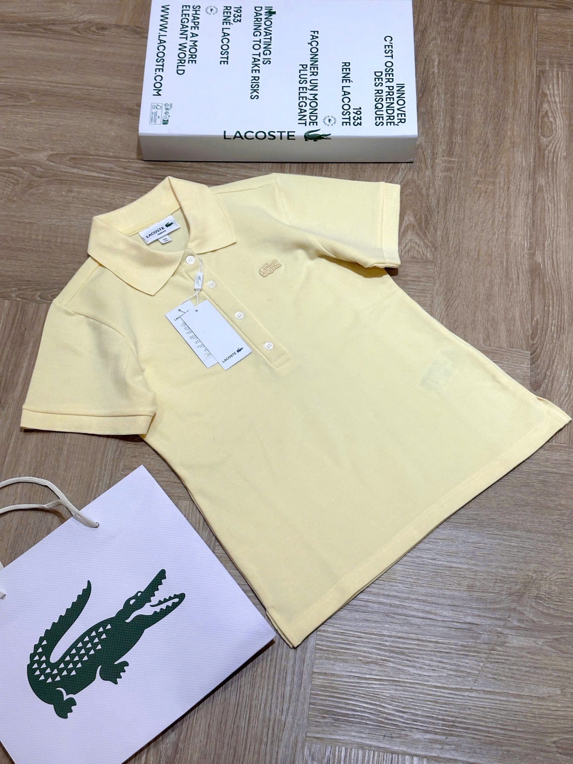 Hàng nhà máy - ÁO POLO VÀNG THÊU CÁ SẤU LCT NỮ