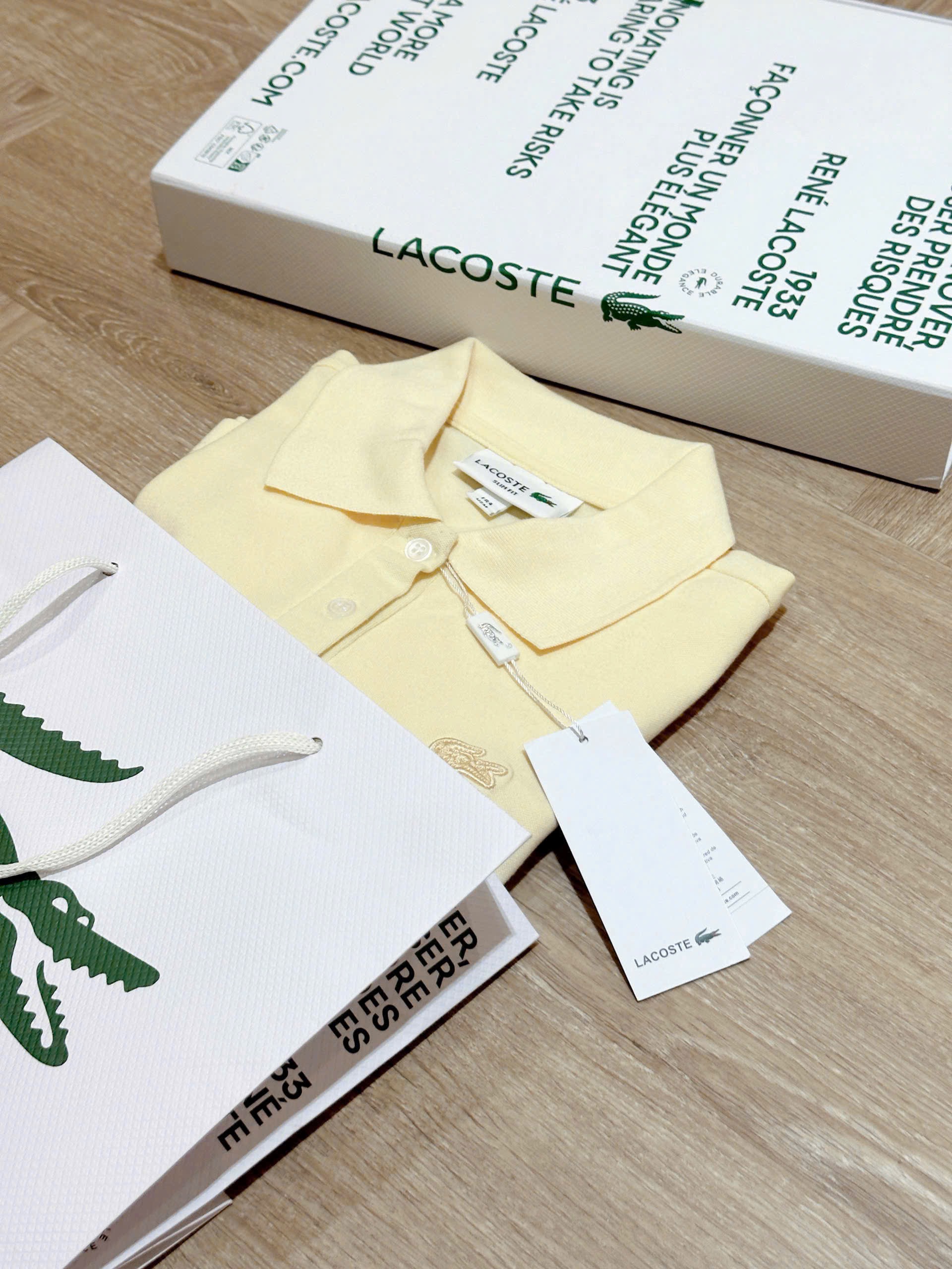Hàng nhà máy - ÁO POLO VÀNG THÊU CÁ SẤU LCT NỮ