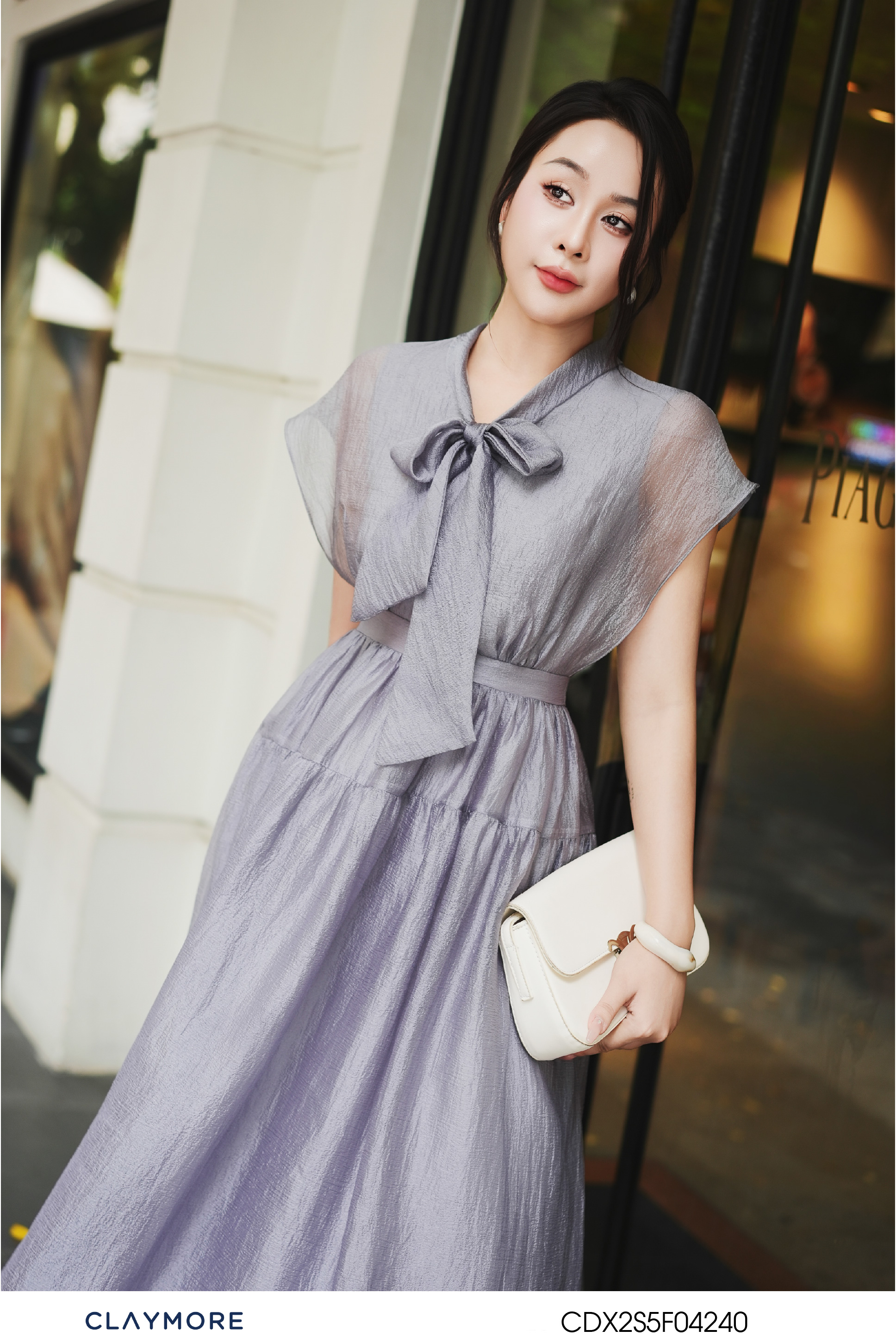 Đầm cổ nơ chân dúm
