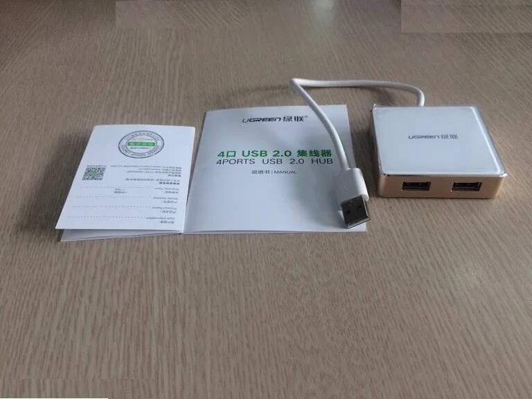 Ugreen 20804 1M màu Trắng Bộ chia HUB USB 2.0 sang 4 USB 2.0 vỏ hợp kim nhôm hỗ trợ nguồn 5V US170