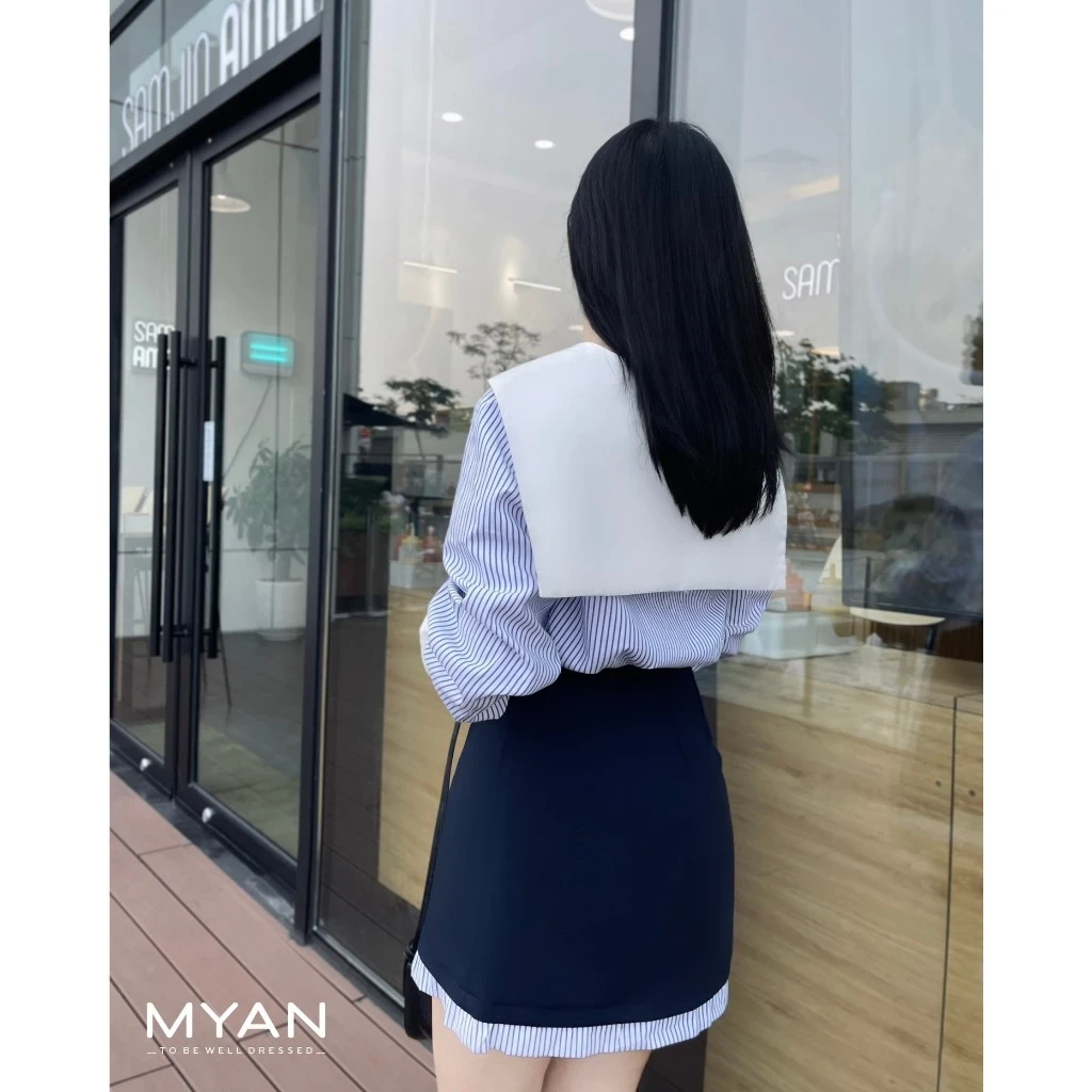 Chân váy mini dáng A phối gấu kẻ