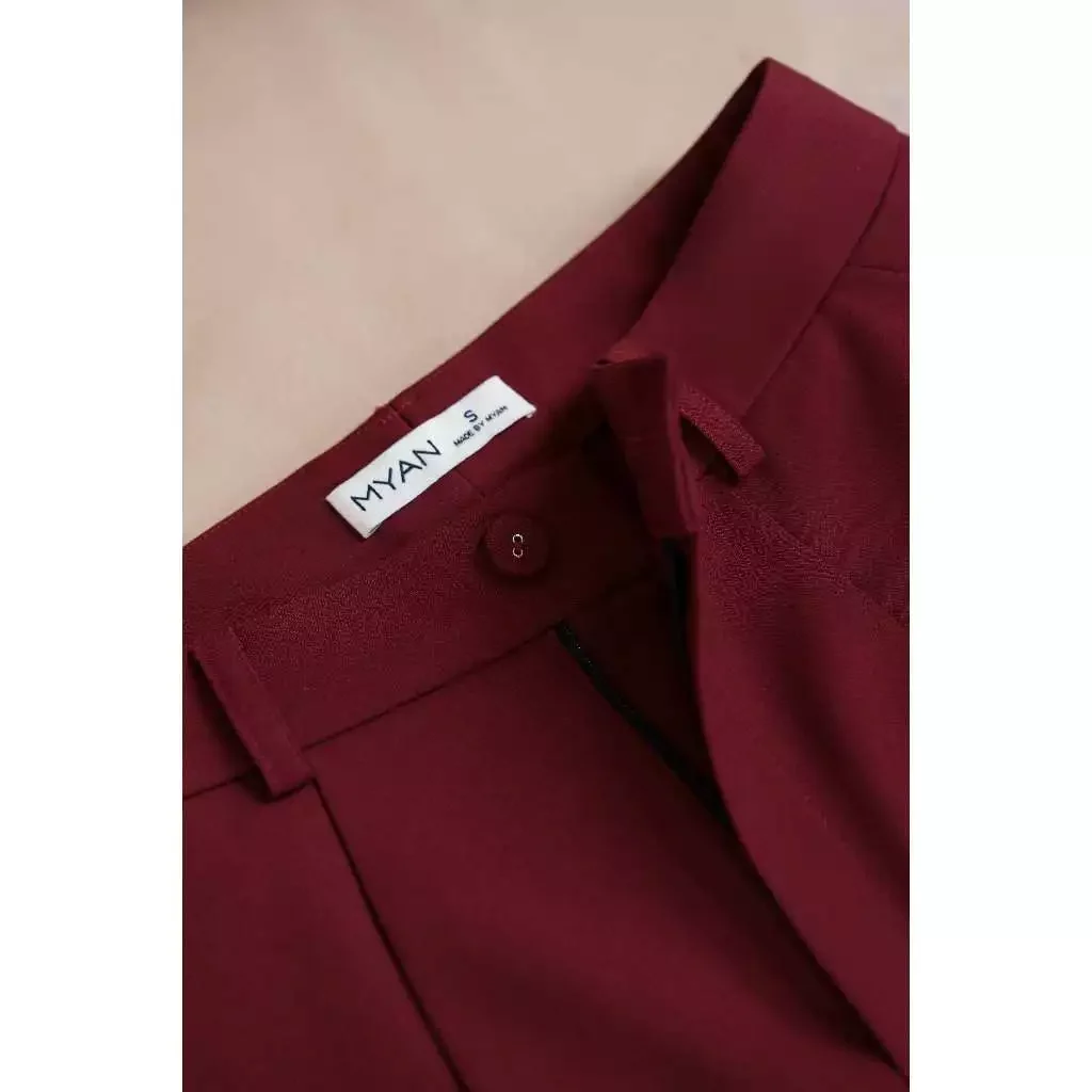 Quần short túi chéo cúc bọc mắt cáo